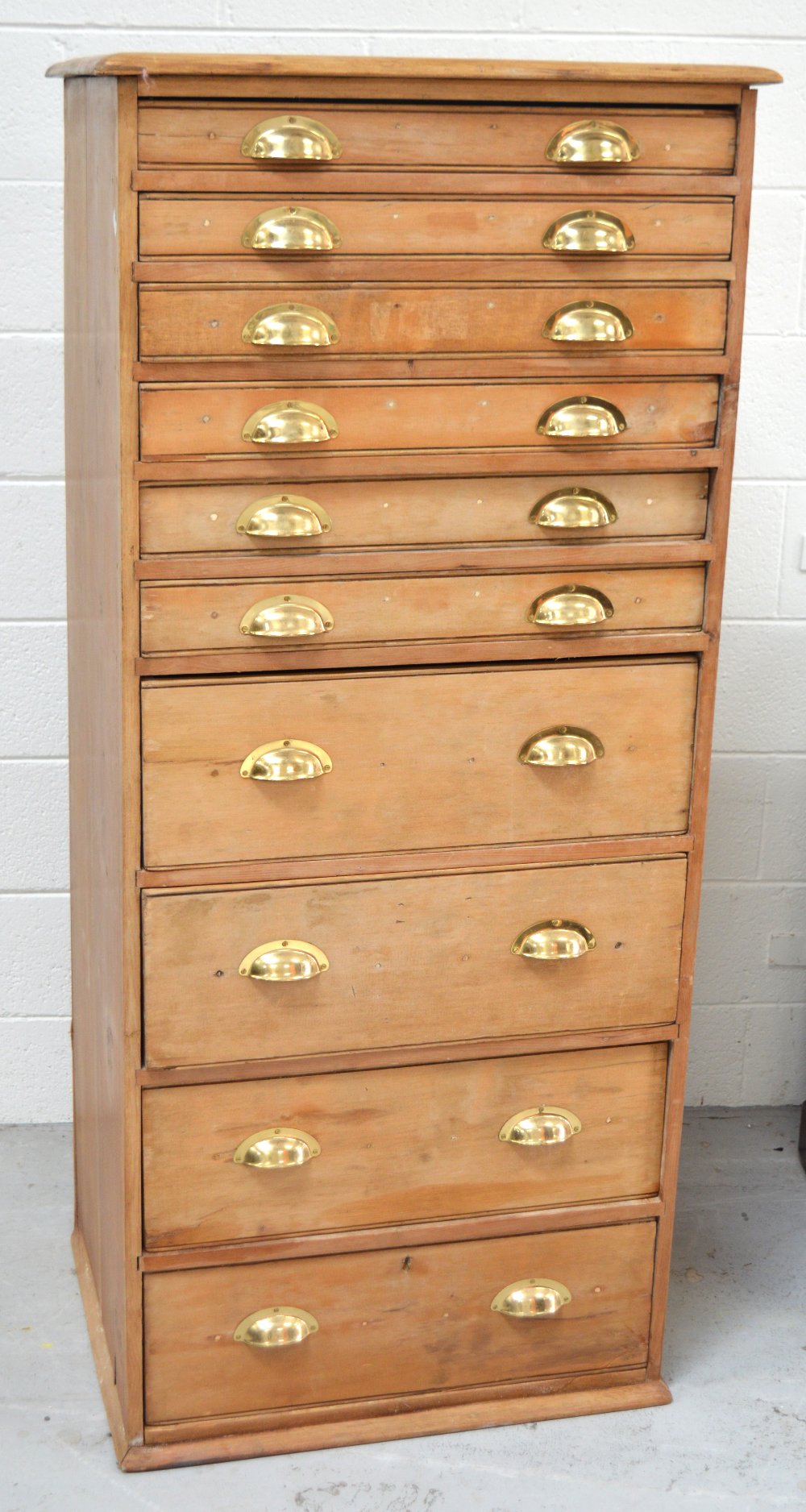 A c1900 pine bank of drawers,
