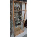 A modern twin door glass display cabinet, width 65cm (contents not included).