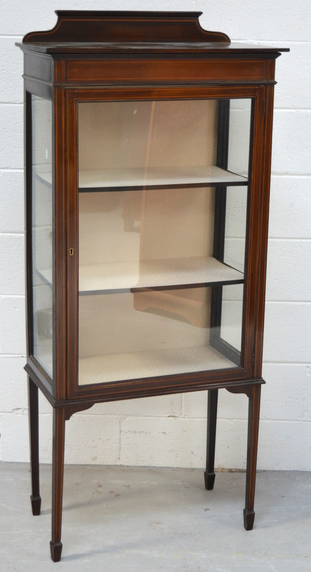 An Edwardian mahogany and boxwood strung display cabinet,