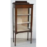 An Edwardian mahogany and boxwood strung display cabinet,