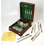 A modern mahogany cased Elkington canteen of silver plated cutlery with steel blades.