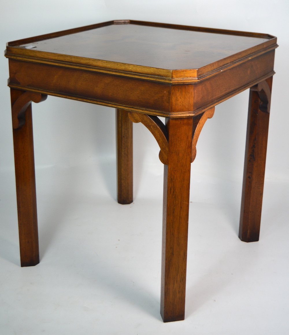 A 20th century square walnut Art Deco side table on block supports, 47 x 47cm.