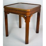 A 20th century square walnut Art Deco side table on block supports, 47 x 47cm.