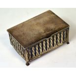 A George V hallmarked silver and copper Arts and Crafts wooden lined cigarette box,