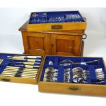 An oak cased canteen of Cavendish silver plated cutlery comprising three lift-out trays.