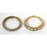 An 18ct gold half eternity ring set with nine diamonds and a white metal eternity ring set with