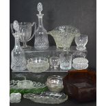 A quantity of cut glass crystal and pressed glass to include decanters, drinking glasses,