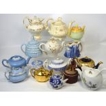 Two boxes of teapots to include Victorian examples, a small blue and white Chinese style teapot,