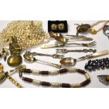 A quantity of costume jewellery to include vintage necklaces,
