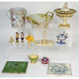 A small quantity of decorative ceramics including a floral decorated gilt heightened scrolling desk