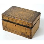 A walnut sewing box containing a quantity of sewing accessories to include thread.