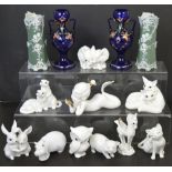 Eight Royal Osborne figurines to include rabbits, cats, otters, owl, foxes, pig,