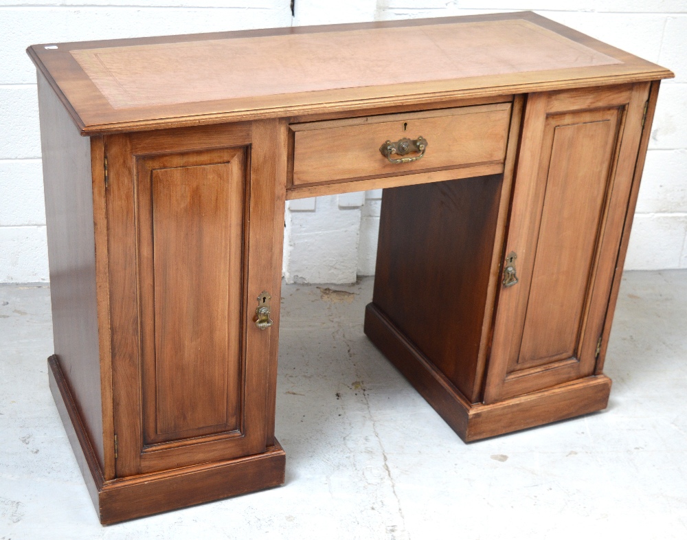 An early 20th century mahogany desk,