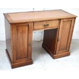 An early 20th century mahogany desk,