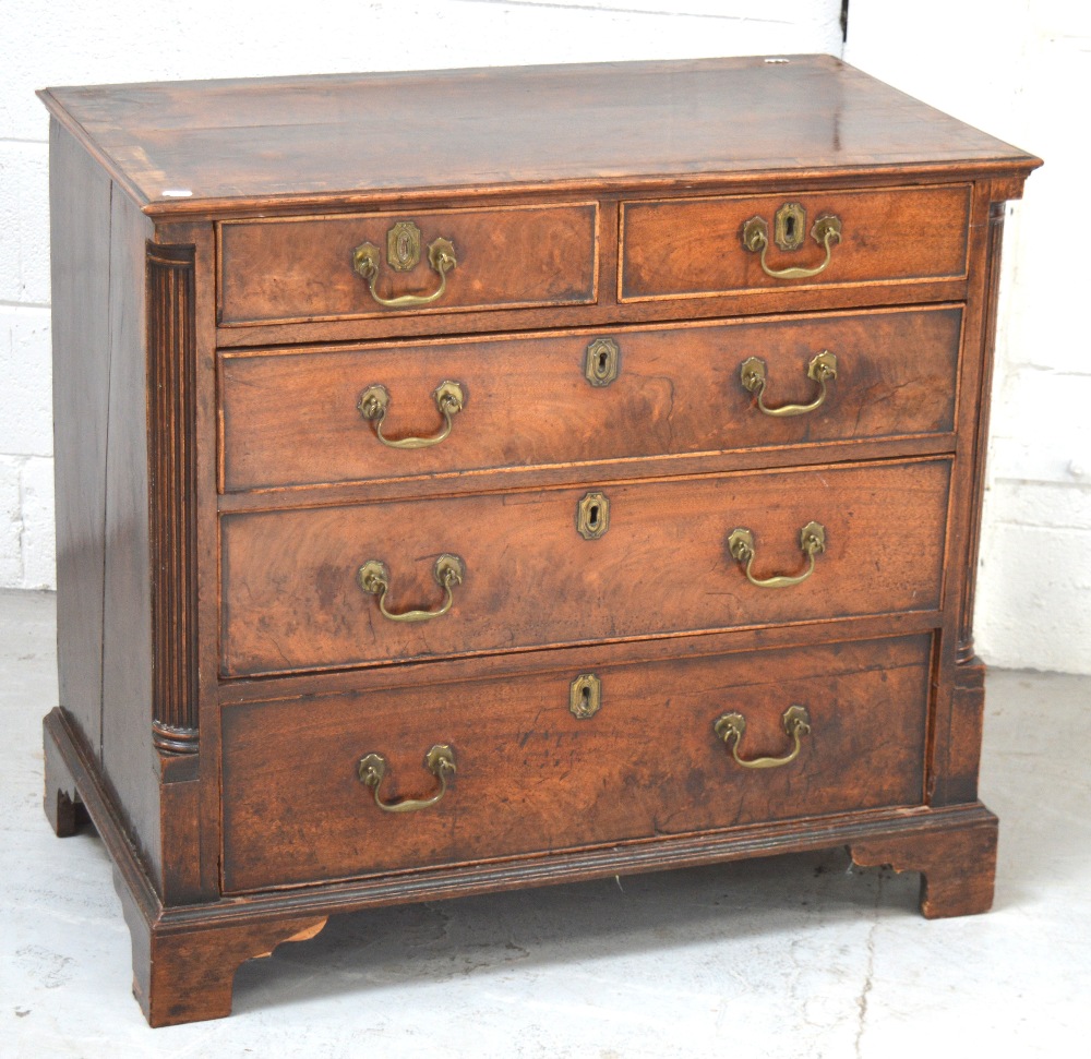 A George III mahogany chest of small proportions,