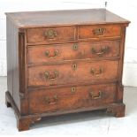 A George III mahogany chest of small proportions,