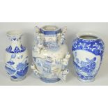 Three 20th century Oriental blue and white baluster vases, varying sizes (3).