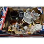 A collection of ceramics to include Torquay ware, Devon Motto ware, two Royal Albert figurines,