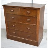 A mid 20th century oak two-over-three chest of drawers, width 105cm.