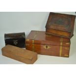 A 19th century stationery box in the form of a chest with four interior compartments lined in