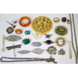 A small quantity of costume jewellery to include amber coloured beads, coral necklace, bangle,