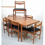 A retro teak McIntosh extending rectangular dining table and a set of six McIntosh chairs,