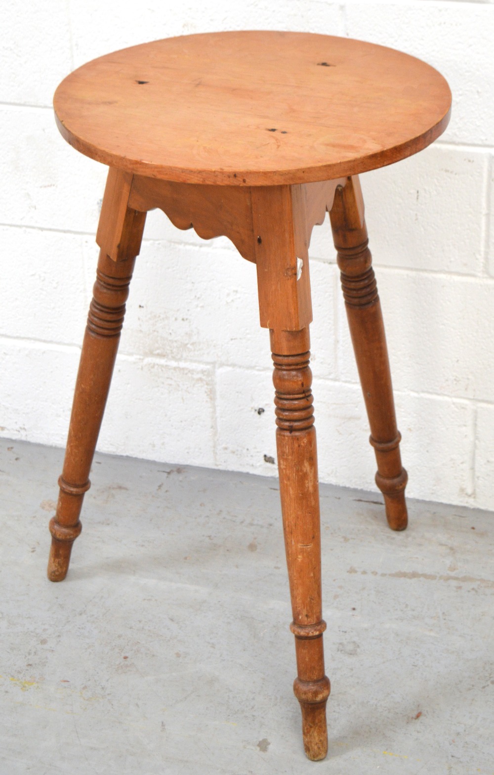 A late 19th century pine cricket table,