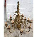 A large twelve branch brass electrolier, height approx 85cm.