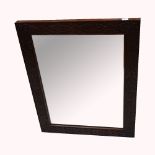 A rectangular mahogany carved framed mirror, 66 x 52cm.