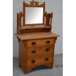 A pine dressing table/chest of drawers,