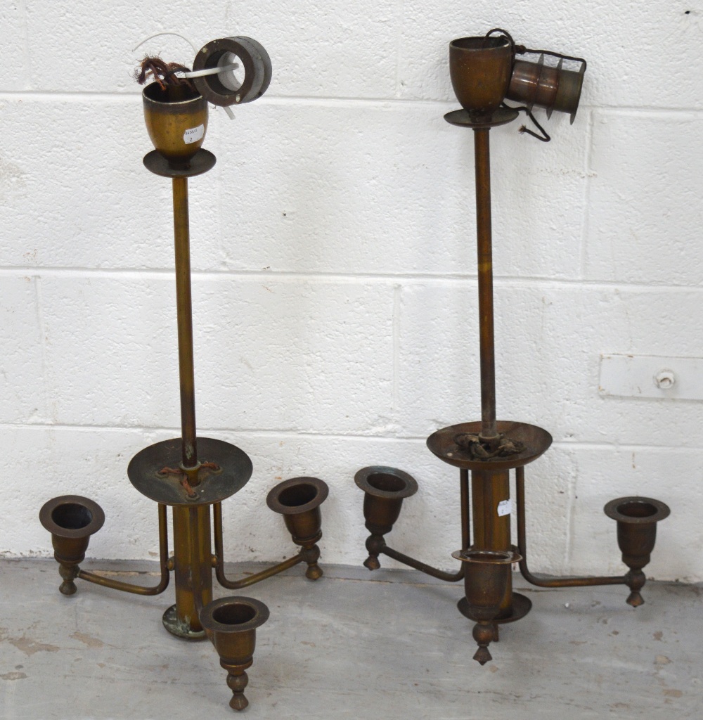 A pair of early 20th century three branch brass electroliers, height of both 70cm.