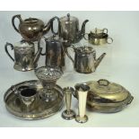 A quantity of plated ware and metalware to include hot water jugs, teapots, filigree basket,