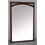 A large freestanding mirror with Art Nouveau style decoration, approx 185 x 110cm.