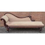 A Victorian mahogany framed chaise longue raised on bulbous legs and castors, length approx 210cm.