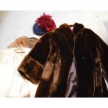 A vintage ladies' beaver lamb fur coat, a lambswool coat with mink collar, a white fur jacket,