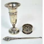 An Elizabeth II hallmarked silver loaded trumpet vase, Birmingham 1960, height 14cm,