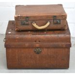 A vintage metal chest, length 64cm and a vintage brown suitcase (2).