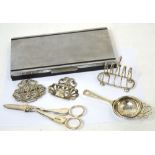 A small Edward VII hallmarked silver toast rack, Sheffield 1904, approx 1.