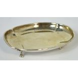 A George V hallmarked silver salver on paw feet, Birmingham 1927, length 10.5cm, approx 1.3ozt.