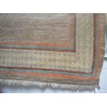 A Tibetan carpet with cotton warp and weft and hand spun woollen pile, approx 302 x 201cm.