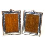 A pair of Edwardian hallmarked silver fronted and oak easel backed photograph frames of rectangular