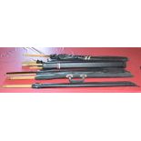 Six two-piece snooker cues including a Riley example,