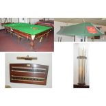 A full size slate bed snooker table, with accessories.