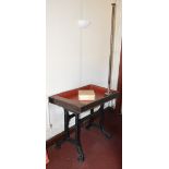 A cast iron based skittles table, the base converted from a Harrison sewing machine treadle.