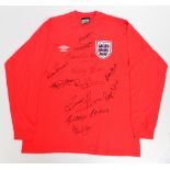 A replica 1966 England World Cup Final shirt, autographed by Roger Hunt, Bobby Charlton,
