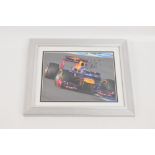 SEBASTIAN VETTEL; an autographed photograph of the leading Formula One Racing Driver,