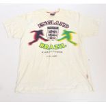 A white autographed England football shirt by Toffs, with original tags,