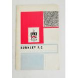 An autographed Burnley FC Official Handbook 1962-63, signed by Adamson, Connelly, McIlroy, Angus,