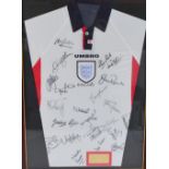 A multi-signed England football shirt with plaque inscribed “England Squad v Italy,