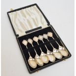 A cased set of six (variously hallmarked) matching silver teaspoons, for A.G.C. and C.G.